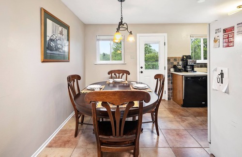 Maryland Heights House | Cozy Red Door Retreat: Exceptional Stay with Pool & Kitchen