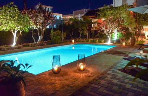Dassia Villa | Discover The Red House in Dassia: Oceanfront Bliss Awaits