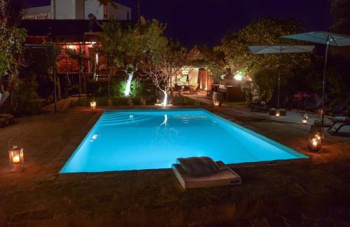 Dassia Villa | Discover The Red House in Dassia: Oceanfront Bliss Awaits