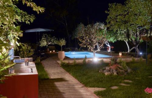 Dassia Villa | Discover The Red House in Dassia: Oceanfront Bliss Awaits