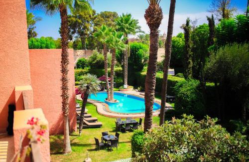 Hivernage House | Oceanfront Bliss at The Red House - Rated 9.3/10!