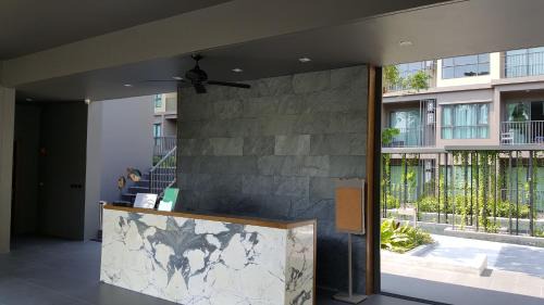 Cha-am Apartment | Relaxing Room with Pool Access at Rain Resort Condominium