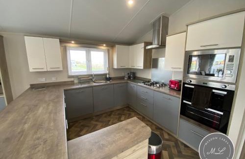 Chapel Saint Leonards House | Pet-Friendly Hot Tub Lodge at Golden Palm Resort