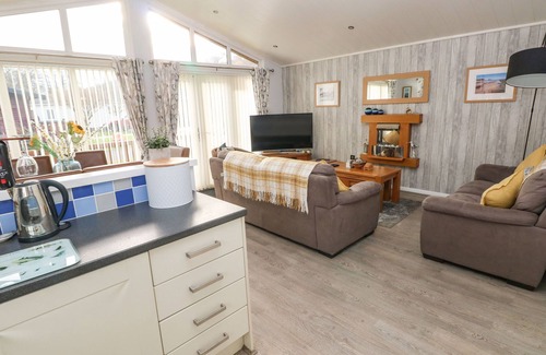 Amroth Cottage | Oceanfront Getaway at The Retreat: Pet Friendly & Family Fun