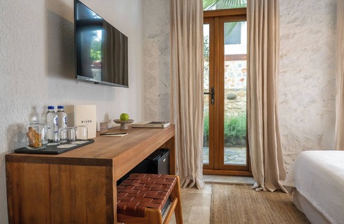 Ula Hotel | Riverside Retreat: Guest Rated 10/10 with Great Amenities