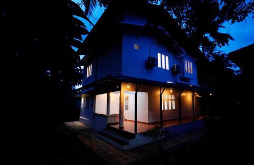 Kozhikode House | Charming Riverside Guesthouse: Pet-Friendly & Family-Welcoming