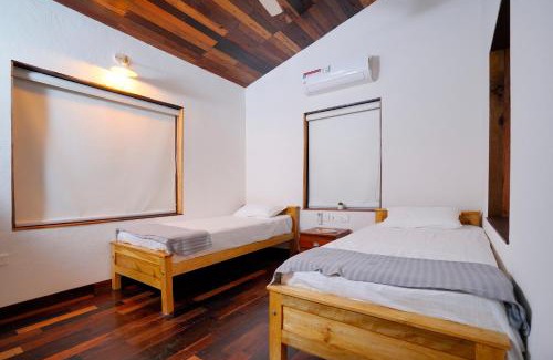 Kozhikode House | Charming Riverside Guesthouse: Pet-Friendly & Family-Welcoming