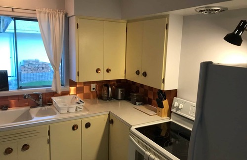 Quesnel House | Explore The Riverwalk House with a Convenient Kitchen Suite