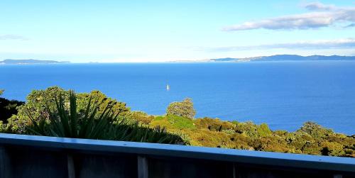 Tuateawa House | Relax at The Rock: Oceanfront Paradise with Private Beach