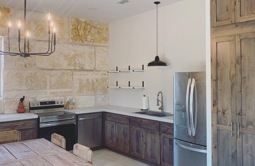 Llano House | Rugged Elegance: The Rock Stack on the Llano River