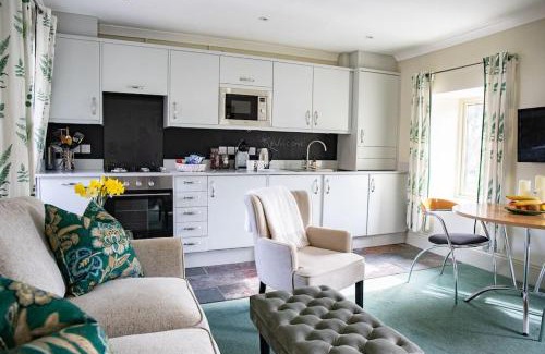 Redbrook House | Discover The Rookery Cottage - Pet-Friendly Getaway