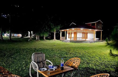 Balakot Resort | The Round Bed Cottage At Country Club Balakot