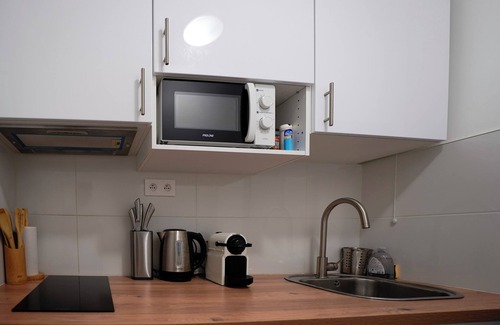 Suresnes Apartment | Brightly Renovated T2 with Kitchen & Family-Friendly Appeal