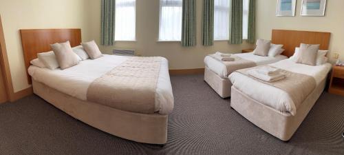 Douglas Promenade Hotel | Discover Oceanfront Comfort at The Rutland Hotel