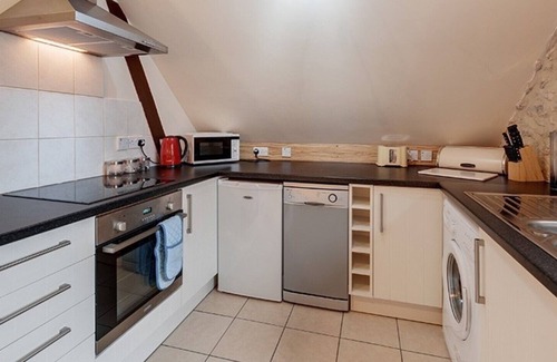 Axminster Apartment | Cozy Getaway at The Saddlery with Breakfast & Kitchen Access