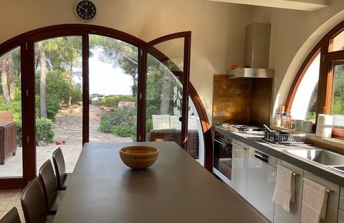 Agii Theodori House | Experience The Saronic Villa - A Jungle Retreat by the Sea