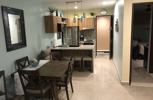 Akumal Condo | Experience The Scarlett MaCaw: Oceanfront Bliss Awaits