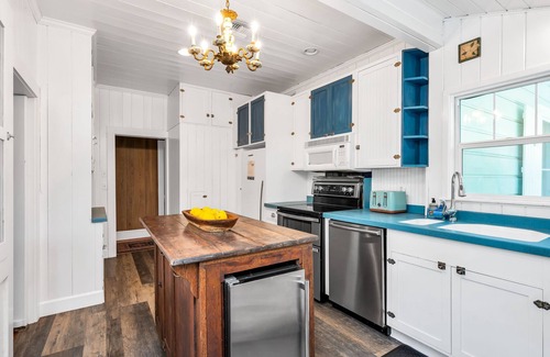 Stuart House | Discover Seaside Treasure: Refreshing Pool & Guesthouse