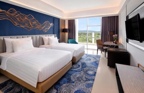 Marinsow Hotel | Relax at The Sentra Manado: Oceanfront Retreat with Pool
