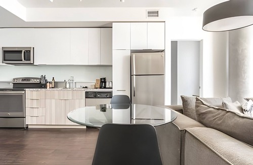 West Bellevue Apartment | Discover Modern Living at The Sophari: Pool & Gym Access