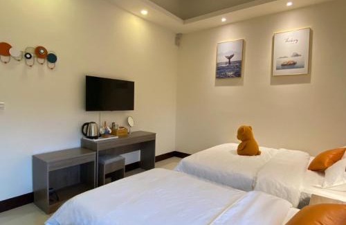 Budai House | Inviting The Sun Never Sets B&B with Hot Tub & Family Fun