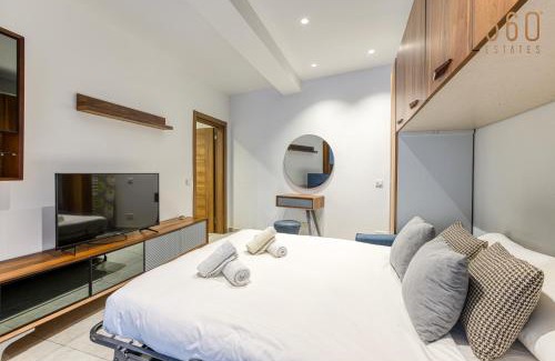 Swieqi Apartment | Relax at The Swieqi Poolside Suites with Family-Friendly Perks