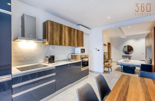 Swieqi Apartment | Relax at The Swieqi Poolside Suites with Family-Friendly Perks