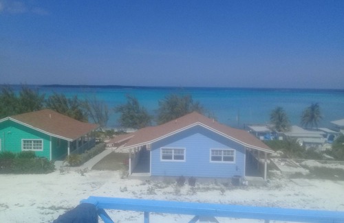 Rolleville Villa | Experience The Swimming Pigs Resort-Peach with Ocean Views