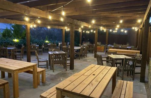Tansley Hotel | Cozy Retreat at The Tavern with Fireplace & Delicious Breakfast