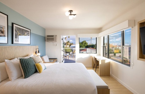 Motel District Hotel | Relax at The Tides Oceanview Inn with Pool & Family Amenities