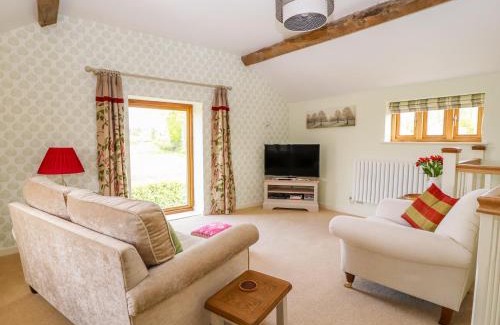 Maesbury Marsh House | Explore The Tractor Shed: Pet-Friendly 5-Star Retreat