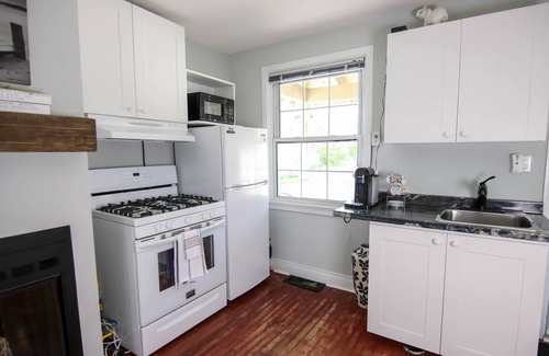 Bracebridge Apartment | Experience Relaxation in the Tuxedo Suite with Spa Amenities