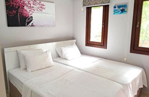 Oludeniz Apartment | Experience Oludeniz Evleri C3 Suite: Pool & Terrace Escape