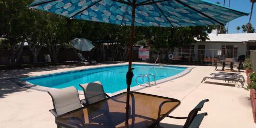 Tahquitz River Estates Apartment | Relax at The Villas of Palm Springs: 4-Star Oasis with Pool