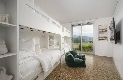 Porepunkah House | Discover The Vineyard Residence: Oceanfront Bliss Awaits