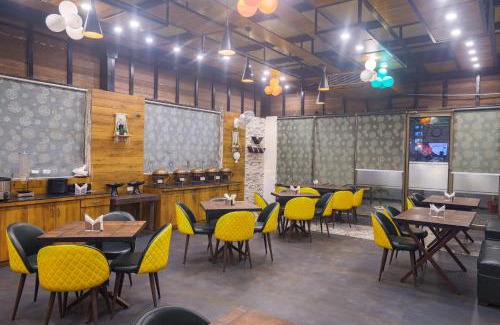 Vrindavan Hotel | Discover The VrindHuts: Family-Friendly with Pool Access