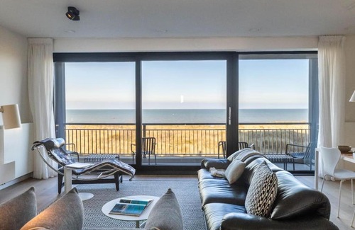 Cadzand-Bad Apartment | Beachfront Retreat: The Wave with Spectacular Sea Views