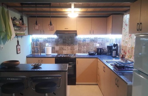 Faistos Apartment | Cozy Wild Rose Apartment with Kitchen & Breakfast Included