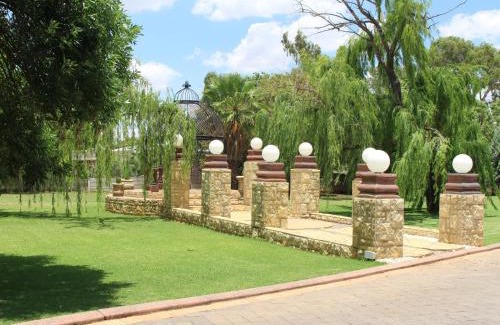 Klerksdorp House | Discover The Willow Tree Guesthouse: 4-Star Family Retreat