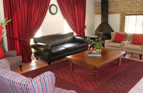 Klerksdorp House | Discover The Willow Tree Guesthouse: 4-Star Family Retreat