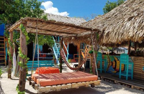 Bocachica House | Experience Oceanfront Bliss at The Wizard & Bar BARU