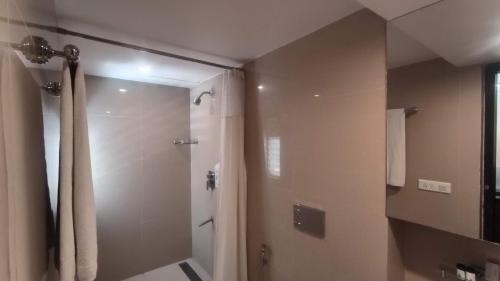 JP Nagar Hotel | Inviting Stay at The Woodrose with Pool & Breakfast Included