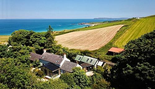 Ballycastle House | Experience The Woods at Whitepark Bay: Hot Tub & Guest Rated 9.8