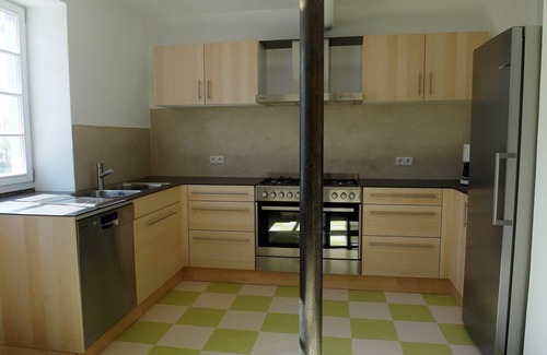 Irmenach House | Bright Yellow Vacation Home with Spa & Breakfast Included