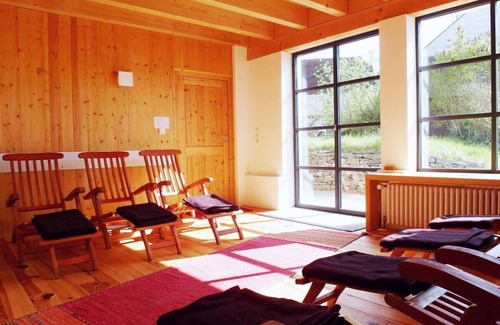 Irmenach House | Bright Yellow Vacation Home with Spa & Breakfast Included