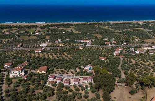 Lepreo Apartment | Top-Rated Thea Residences with Oceanfront Pool Access