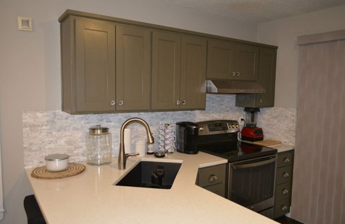 Overland Park House | Guest Rated: Theatre Room with Hot Tub & Fire-pit Oasis