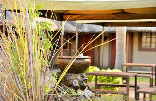 Kasane Hotel | Experience Thebe River Safaris with Pool and Dining Options