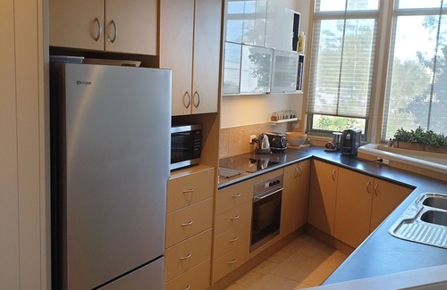Sunshine Bay House | Experience theCOVE North - Absolute Beachfront Retreat