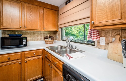 Buford House | Experience Lake Front Bliss with Top-Rated Comforts